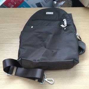 Tumi dark chocolate sling nylon small backpack